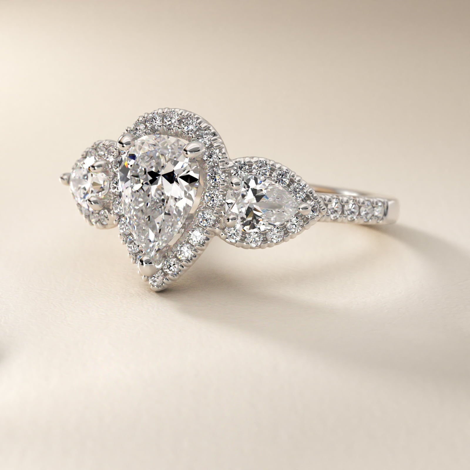 Three-Stone Pear Halo Diamond Engagement Ring in 18k White Gold - Pear Center