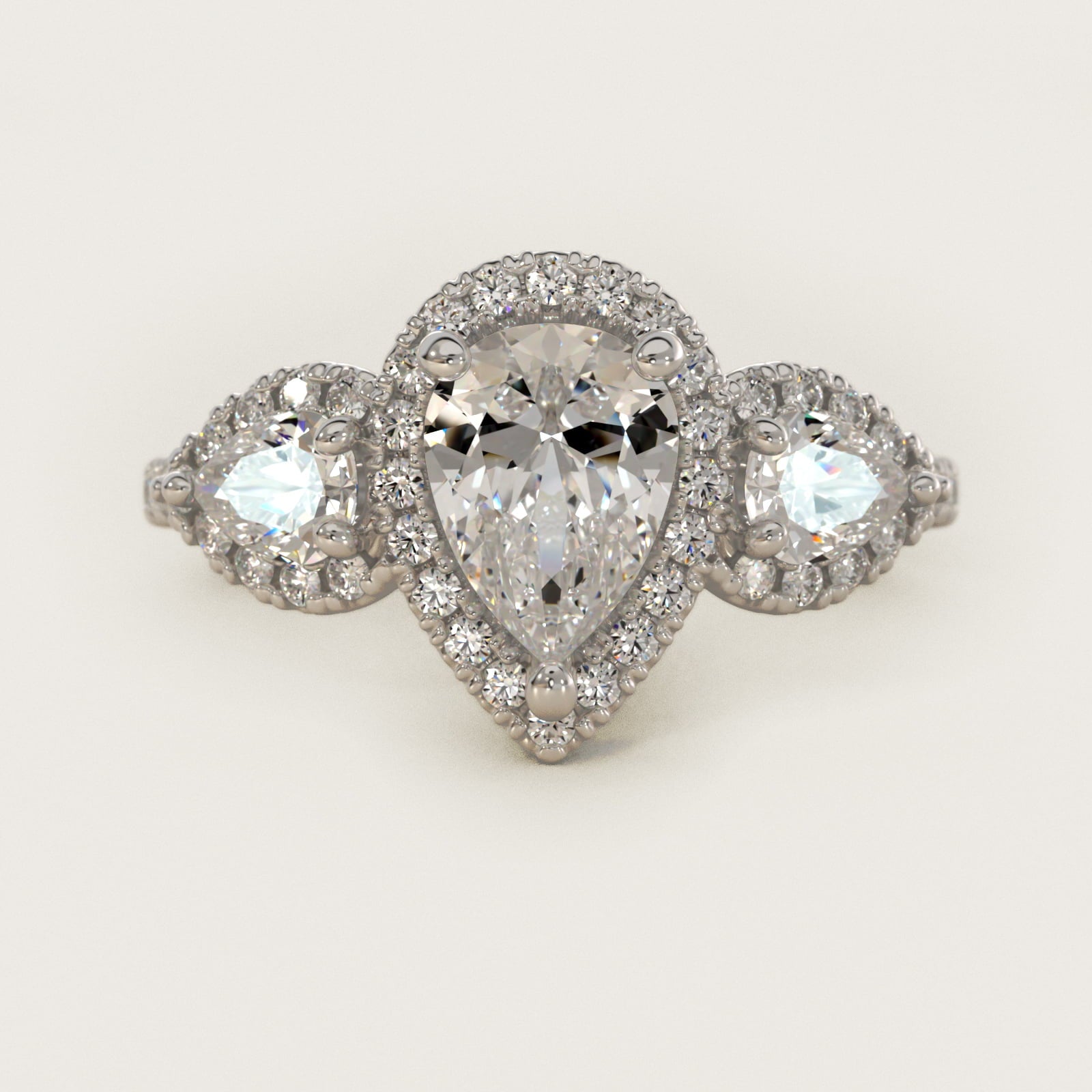 Three-Stone Pear Halo Diamond Engagement Ring in Platinum - Pear Center
