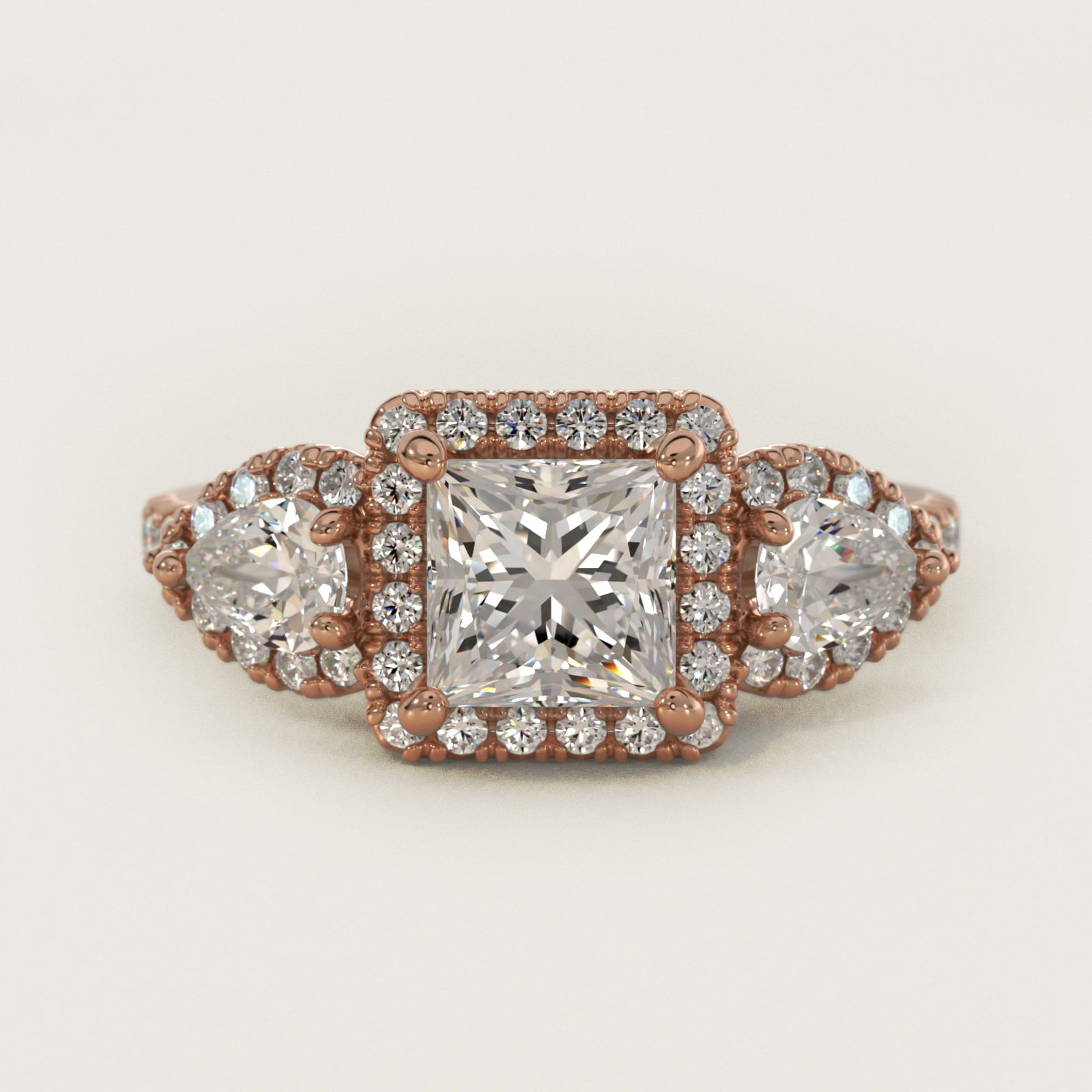 Three-Stone Pear Halo Diamond Engagement Ring in 14k Rose Gold - Princess Center