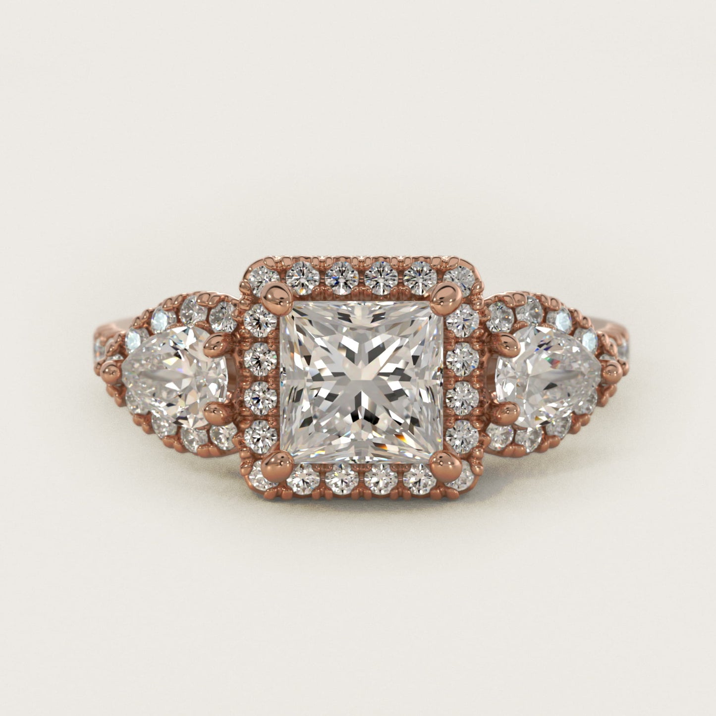 Three-Stone Pear Halo Diamond Engagement Ring in 18k Rose Gold - Princess Center