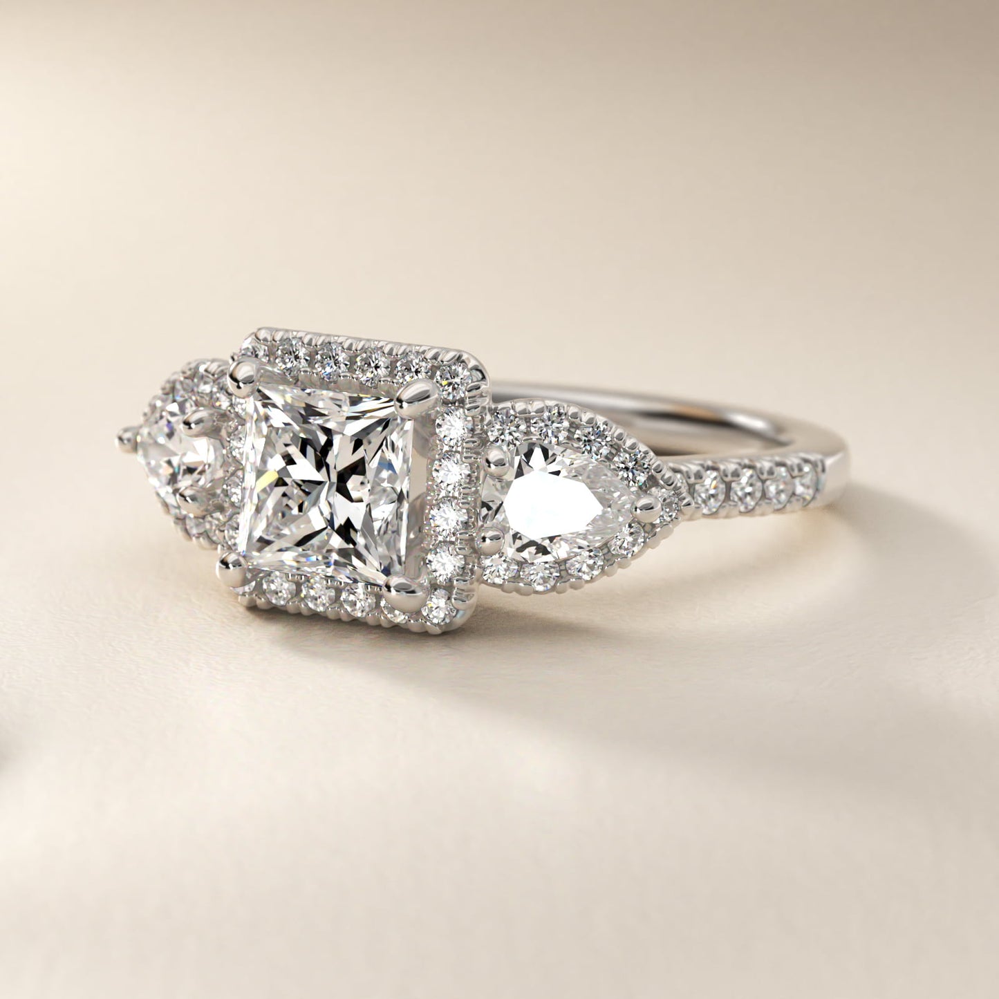 Three-Stone Pear Halo Diamond Engagement Ring in 18k White Gold - Princess Center