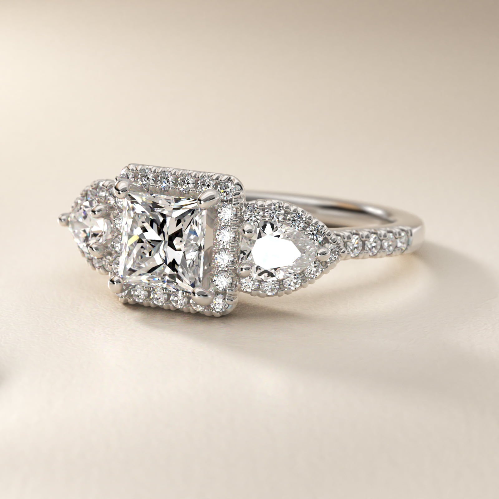 Three-Stone Pear Halo Diamond Engagement Ring in 18k White Gold - Princess Center