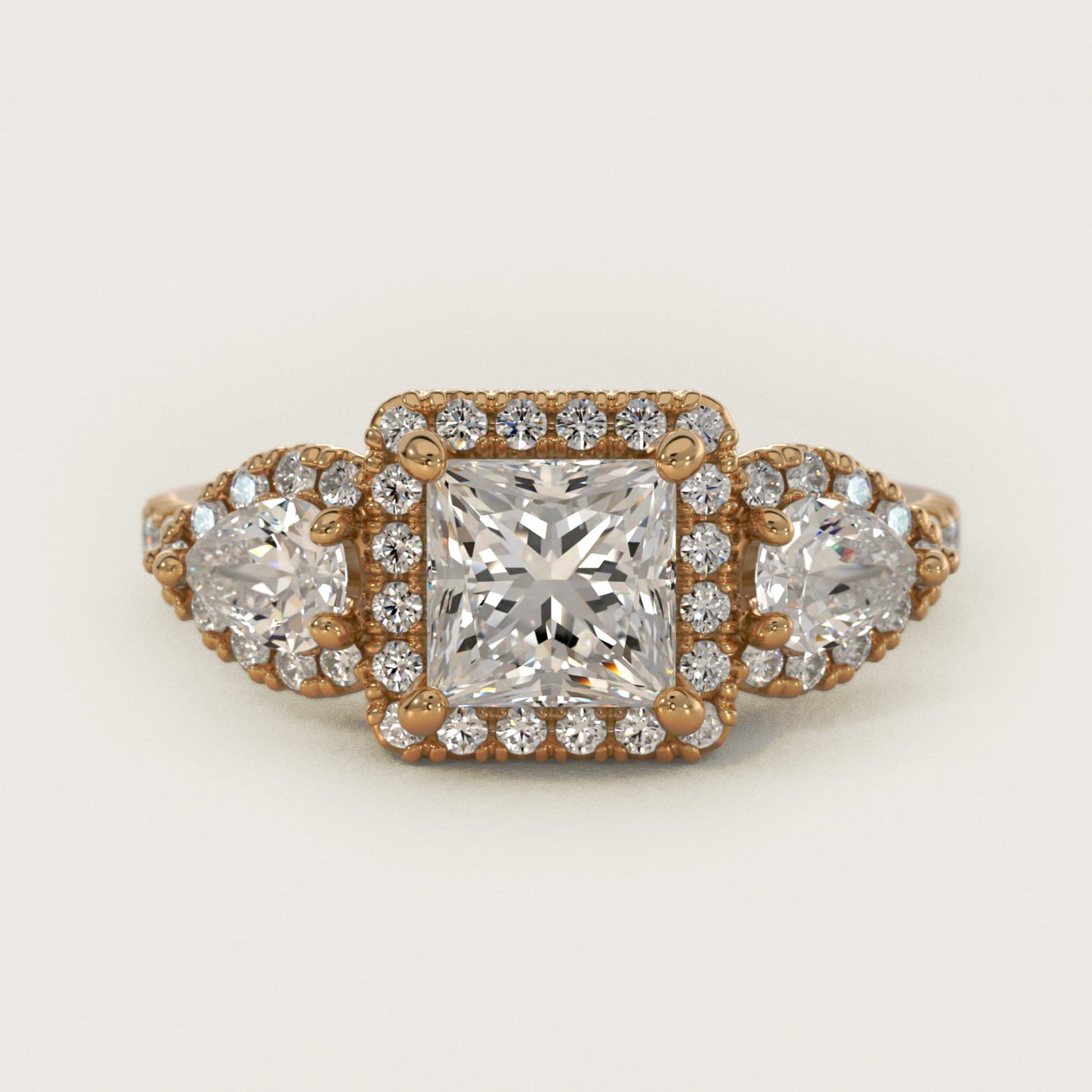 Three-Stone Pear Halo Diamond Engagement Ring in 14k Yellow Gold - Princess Center