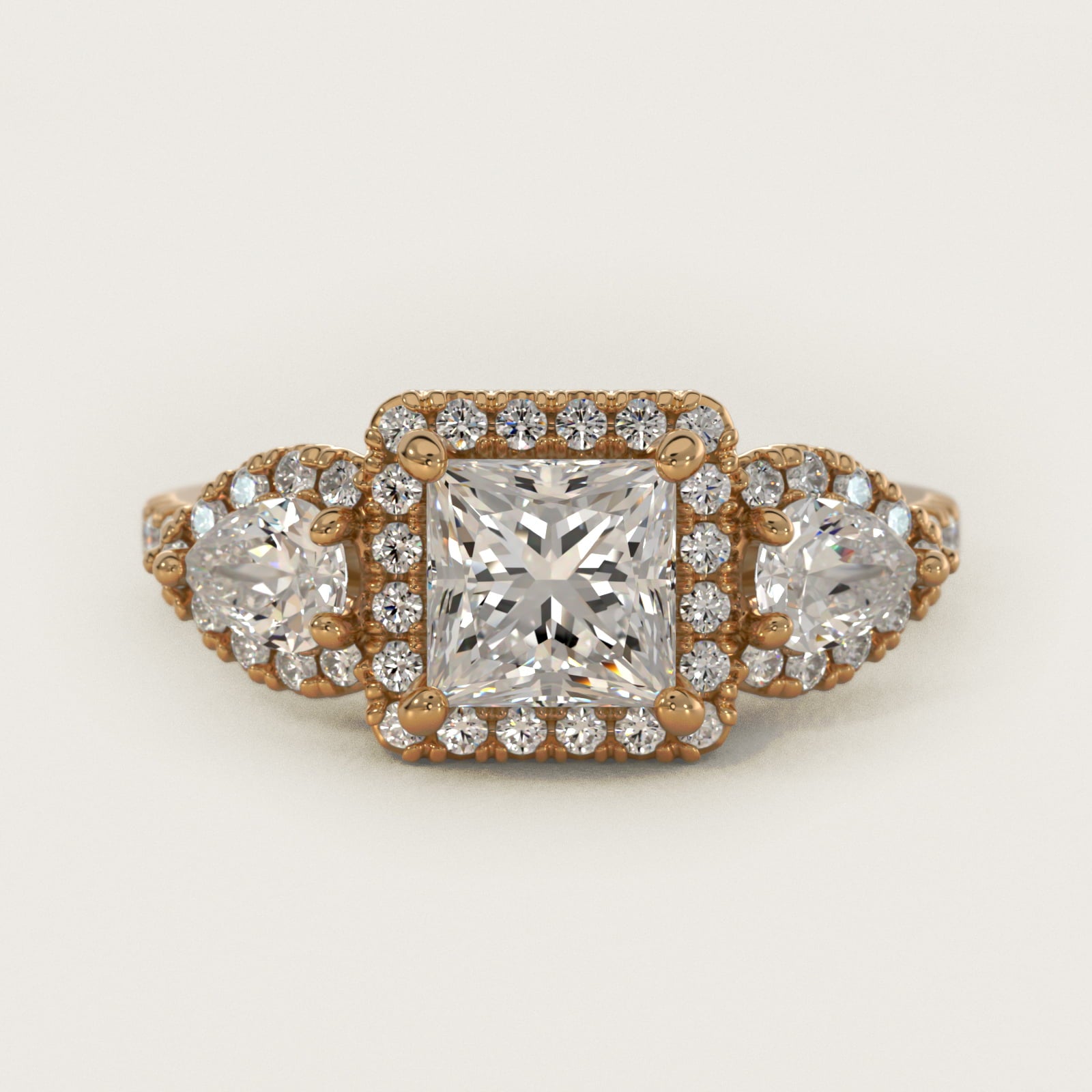 Three-Stone Pear Halo Diamond Engagement Ring in 14k Yellow Gold - Princess Center