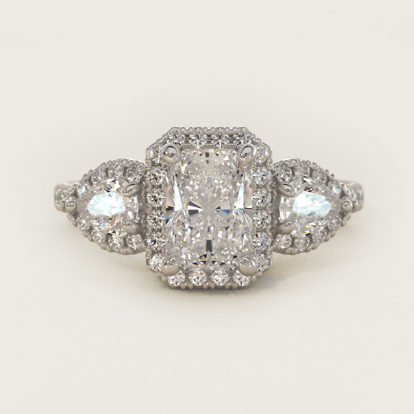 Three-Stone Pear Halo Diamond Engagement Ring in 18k White Gold - Radiant Center