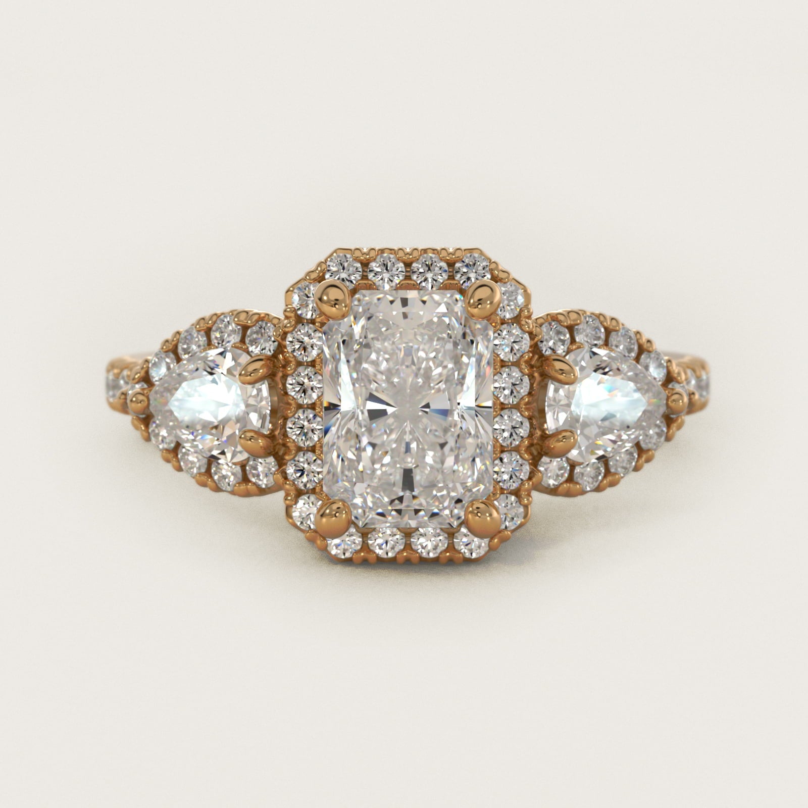 Three-Stone Pear Halo Diamond Engagement Ring in 14k Yellow Gold - Radiant Center