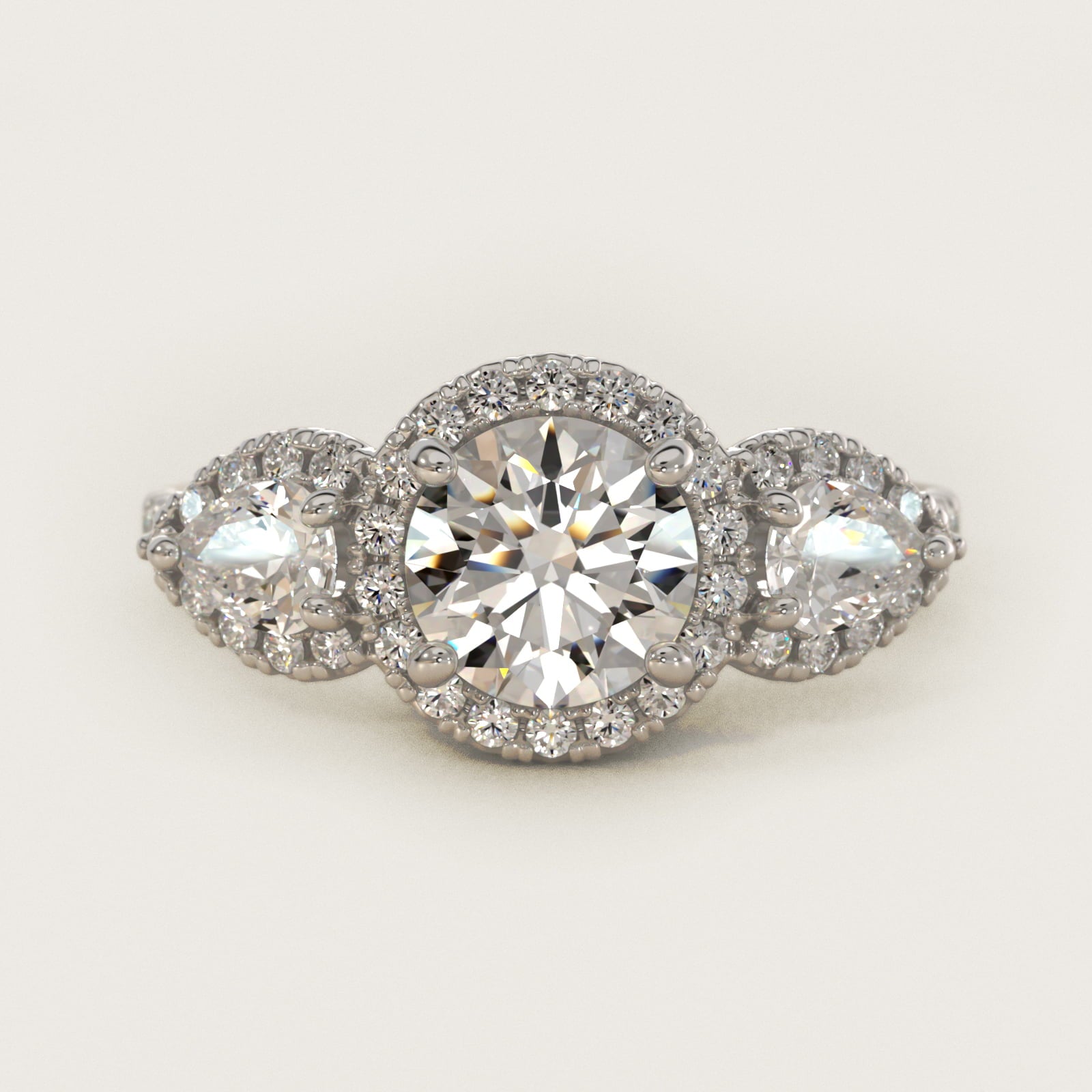 Three-Stone Pear Halo Diamond Engagement Ring in 18k White Gold - Round Center