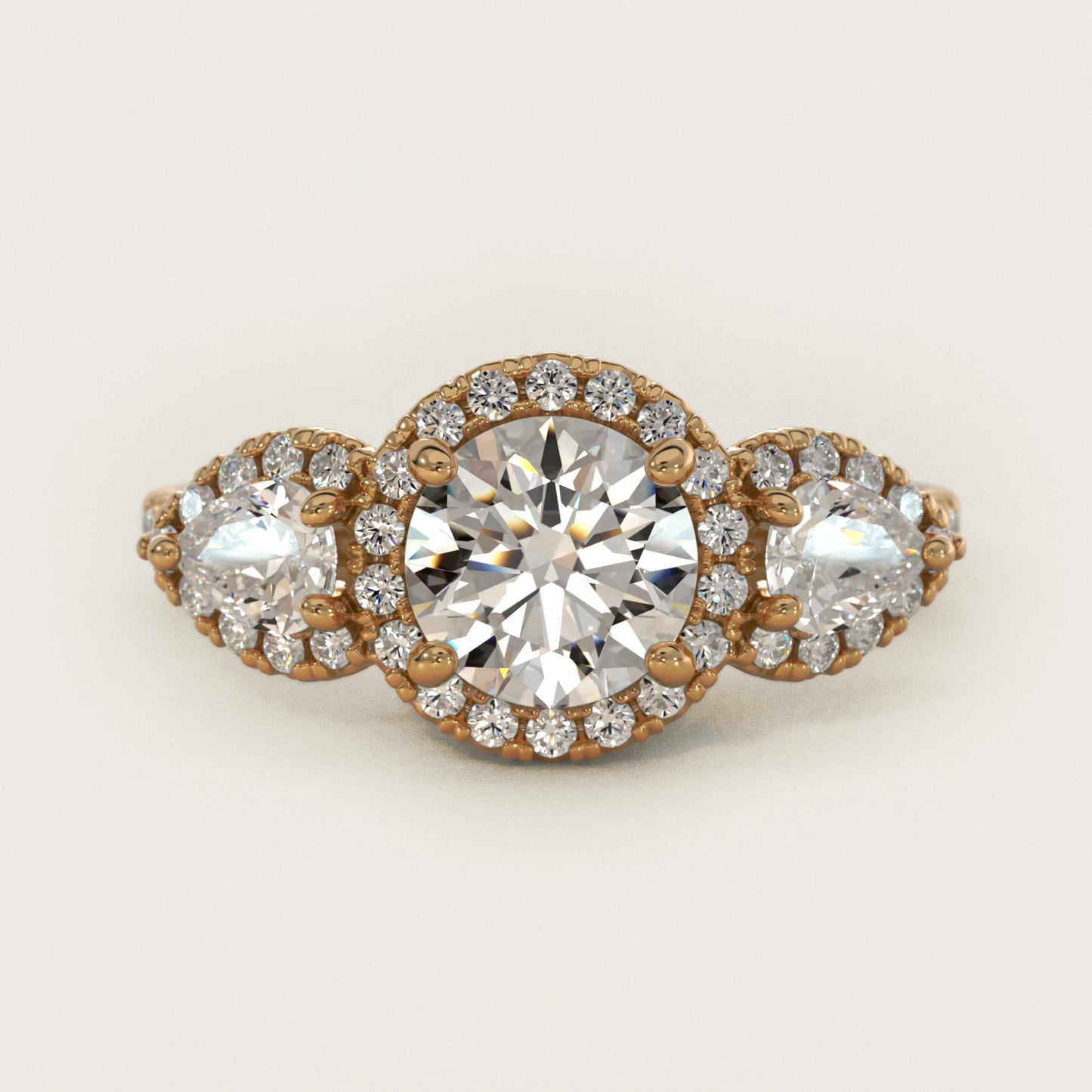 Three-Stone Pear Halo Diamond Engagement Ring in 14k Yellow Gold - Round Center