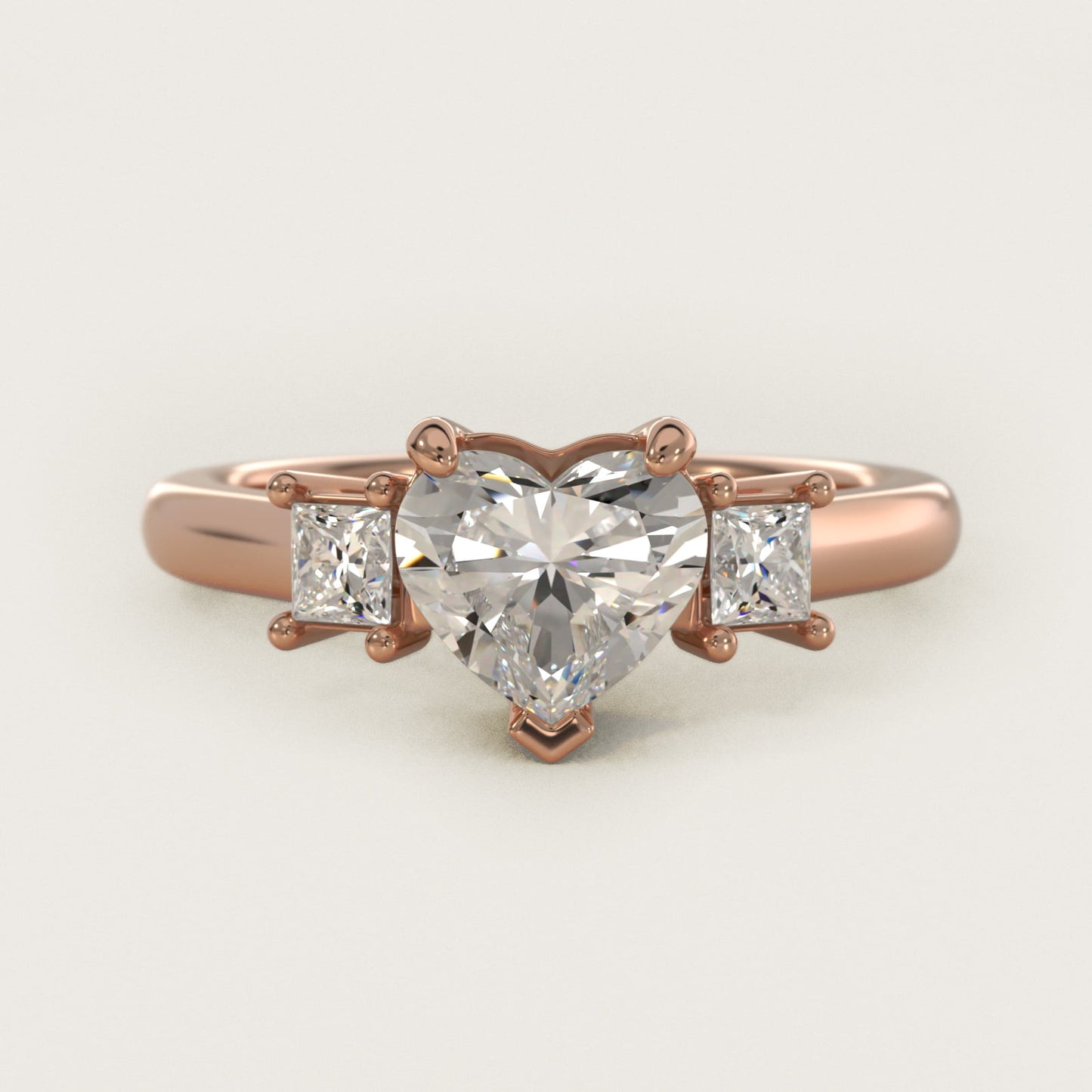 Three-Stone Princess Diamond Engagement Ring in 14k Rose Gold (1/3 ct. tw.) - Heart Center