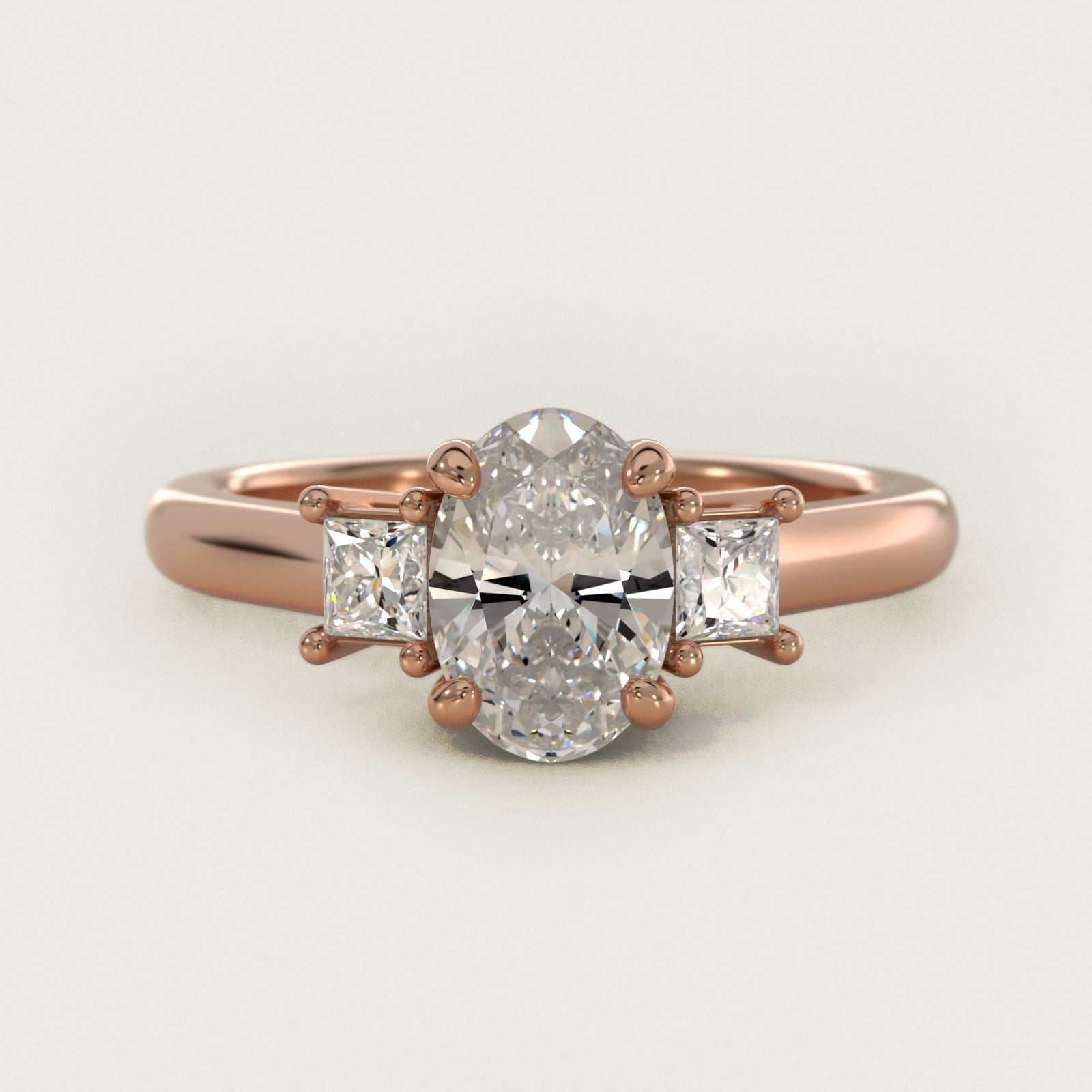 Three-Stone Princess Diamond Engagement Ring in 14k Rose Gold (1/3 ct. tw.) - Oval Center