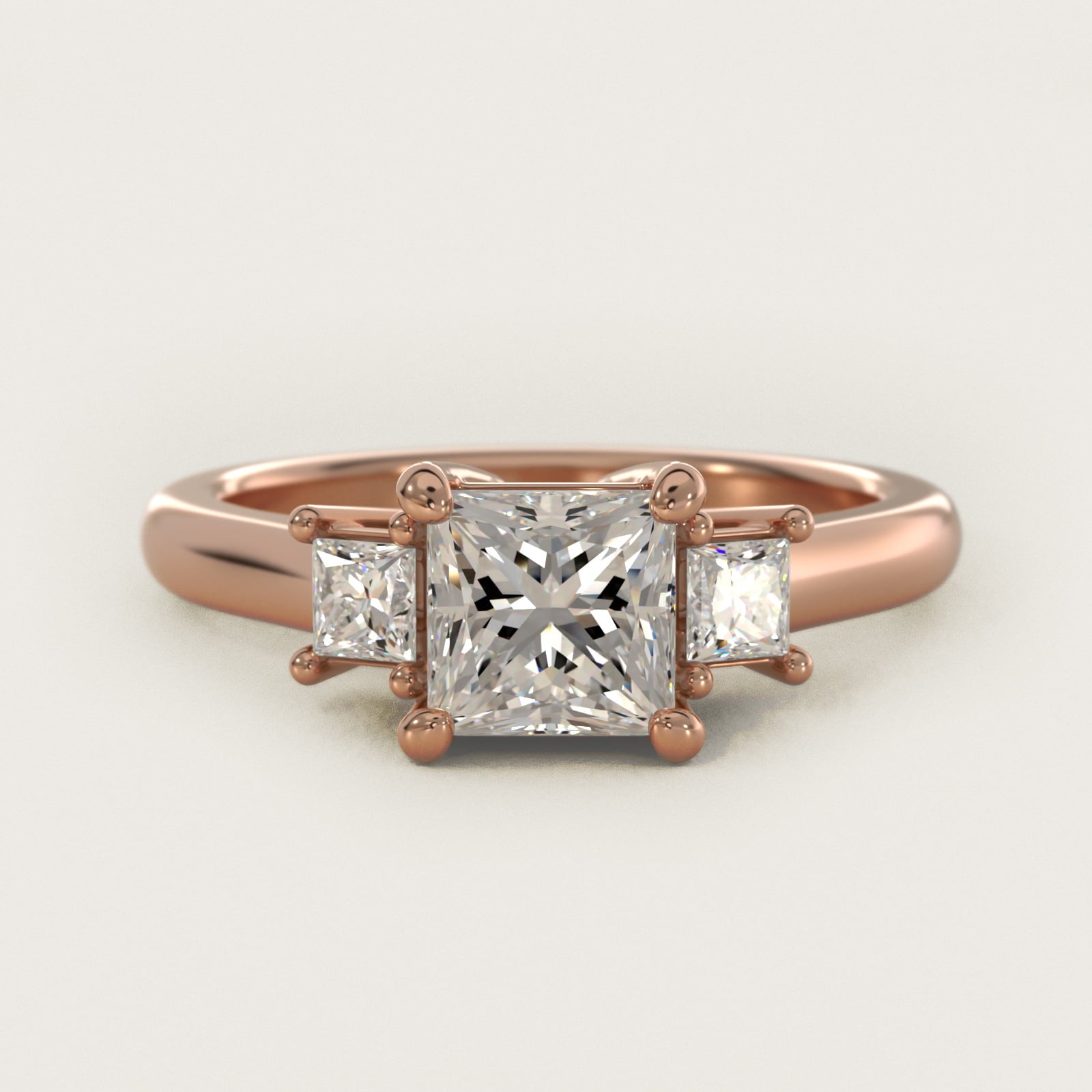 Three-Stone Princess Diamond Engagement Ring in 18k Rose Gold (1/3 ct. tw.) - Princess Center