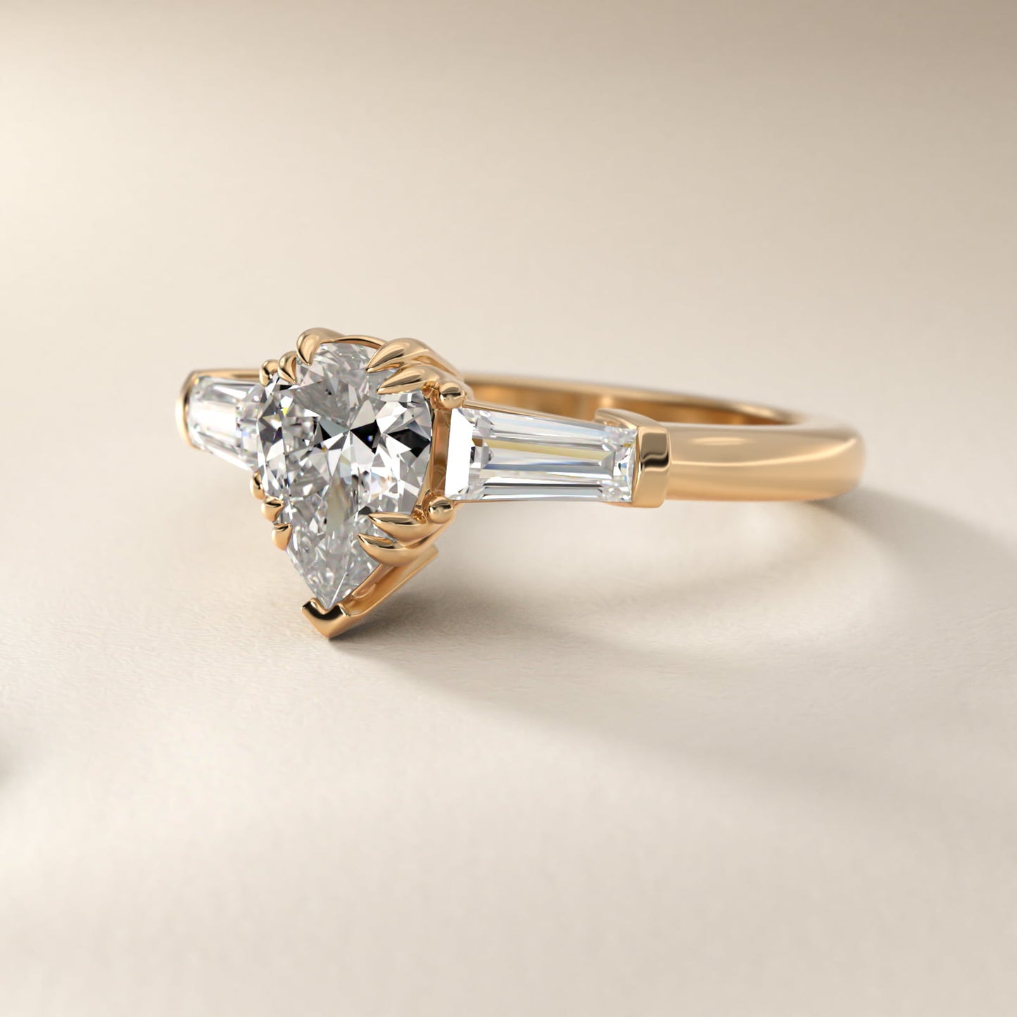 Three-Stone Tapered Baguette Diamond Engagement Ring in 14K Yellow Gold (1/2 ct. tw.) - Pear Center