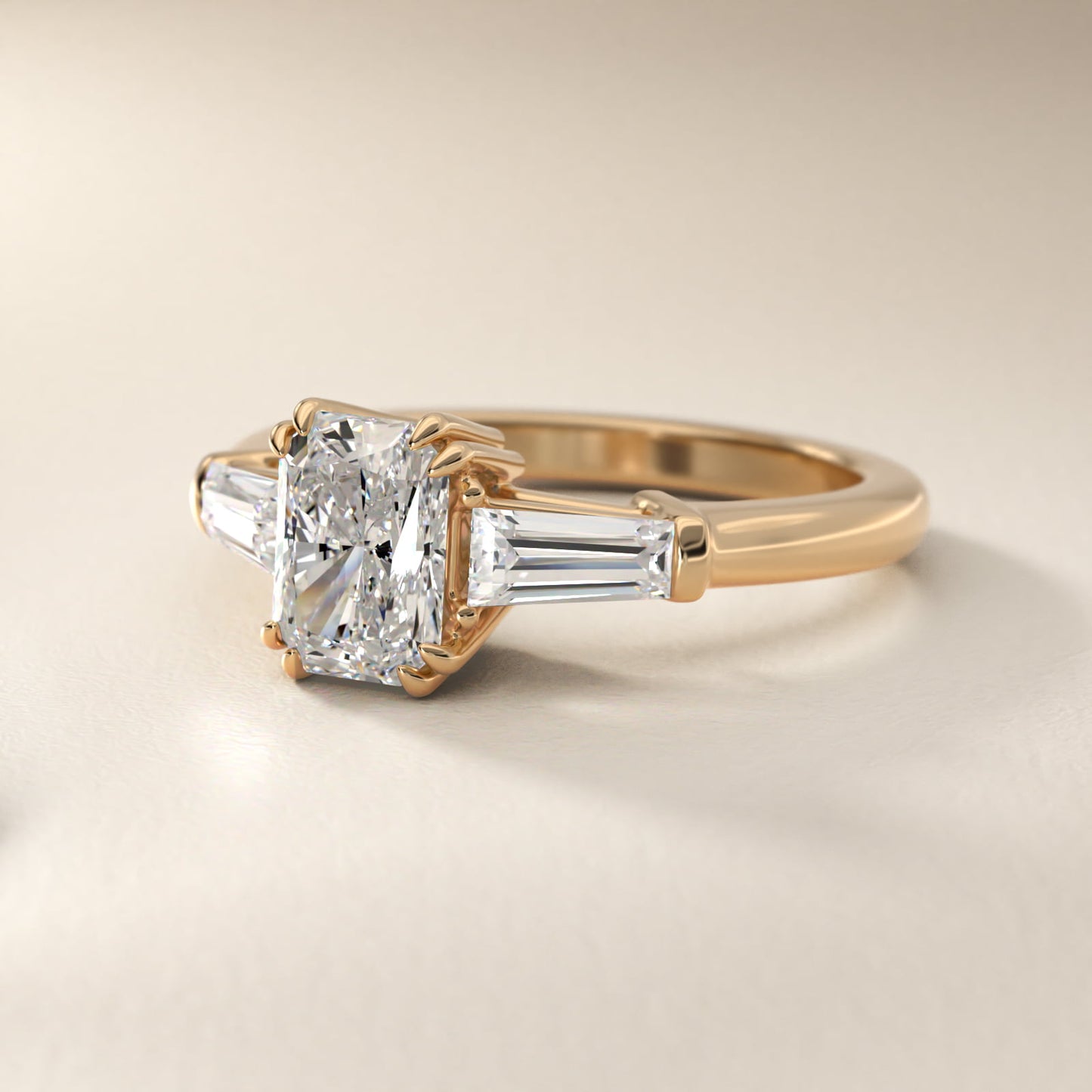 Three-Stone Tapered Baguette Diamond Engagement Ring in 14K Yellow Gold (1/2 ct. tw.) - Radiant Center