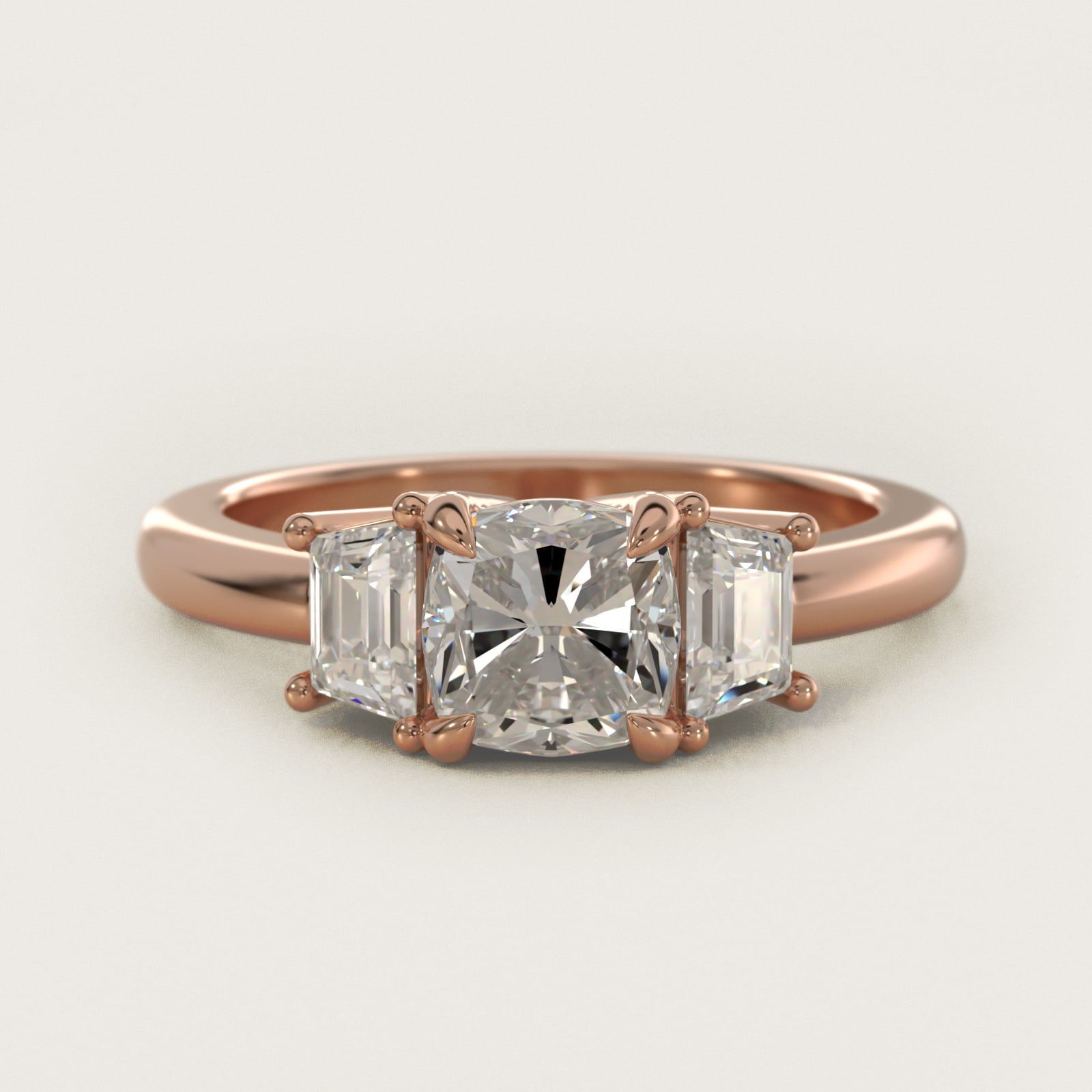 Three-Stone Trapezoid Sidestone Diamond Engagement Ring in 14k Rose Gold (1/2 ct. tw.) - Cushion Center