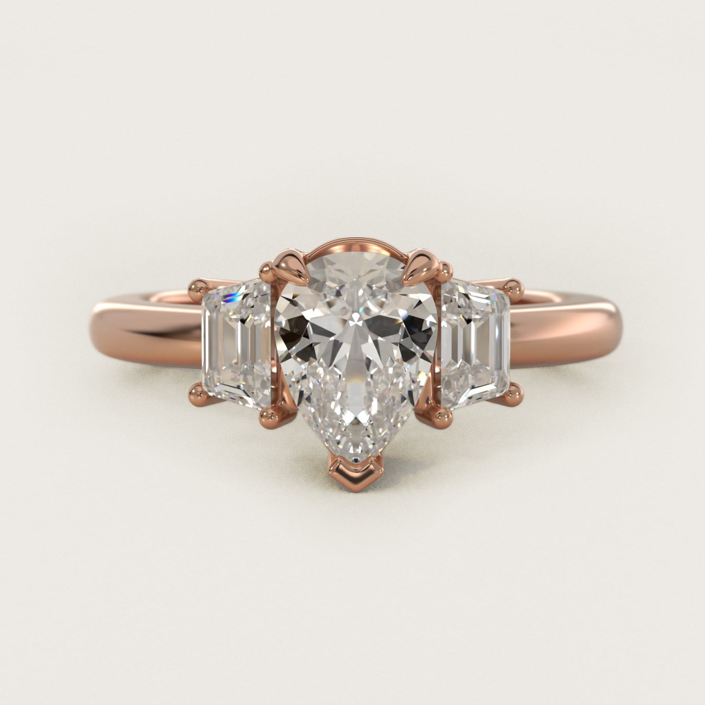 Three-Stone Trapezoid Sidestone Diamond Engagement Ring in 14k Rose Gold (1/2 ct. tw.) - Pear Center