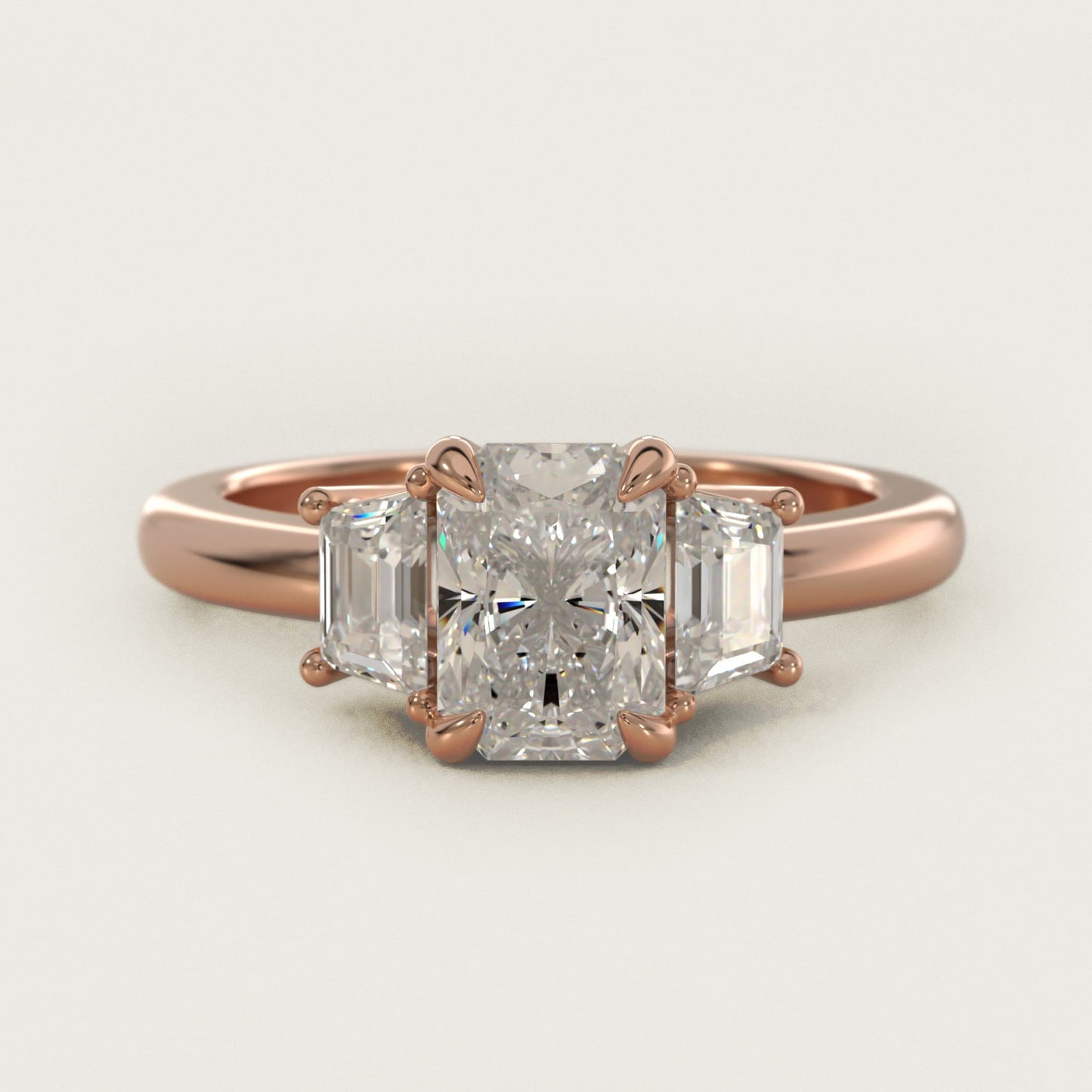 Three-Stone Trapezoid Sidestone Diamond Engagement Ring in 18k Rose Gold (1/2 ct. tw.) - Radiant Center