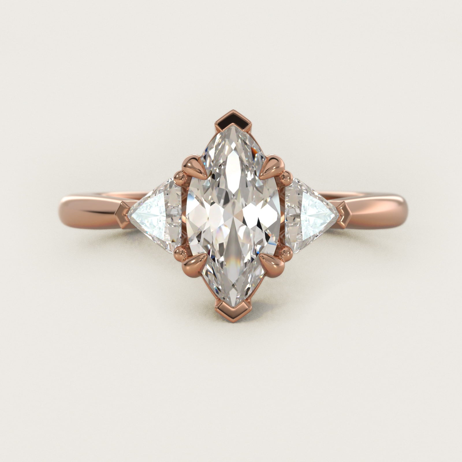 Three-Stone Trillion Diamond Engagement Ring in 14k Rose Gold (1/3 ct. tw.) - Marquise Center