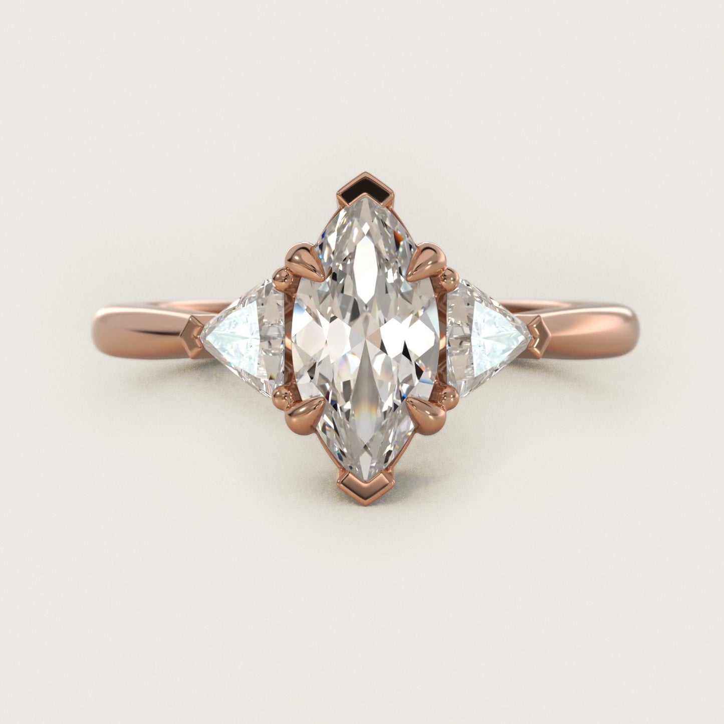 Three-Stone Trillion Diamond Engagement Ring in 18k Rose Gold (1/3 ct. tw.) - Marquise Center