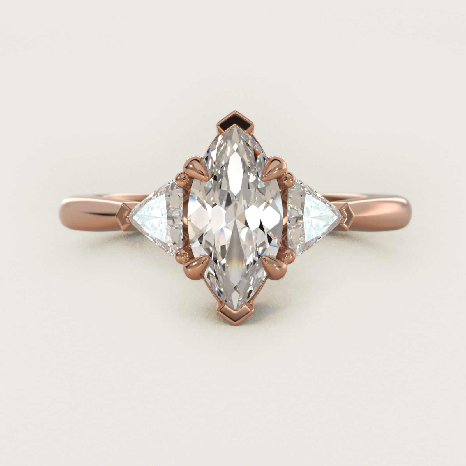 Three-Stone Trillion Diamond Engagement Ring in 18k Rose Gold (1/3 ct. tw.) - Marquise Center