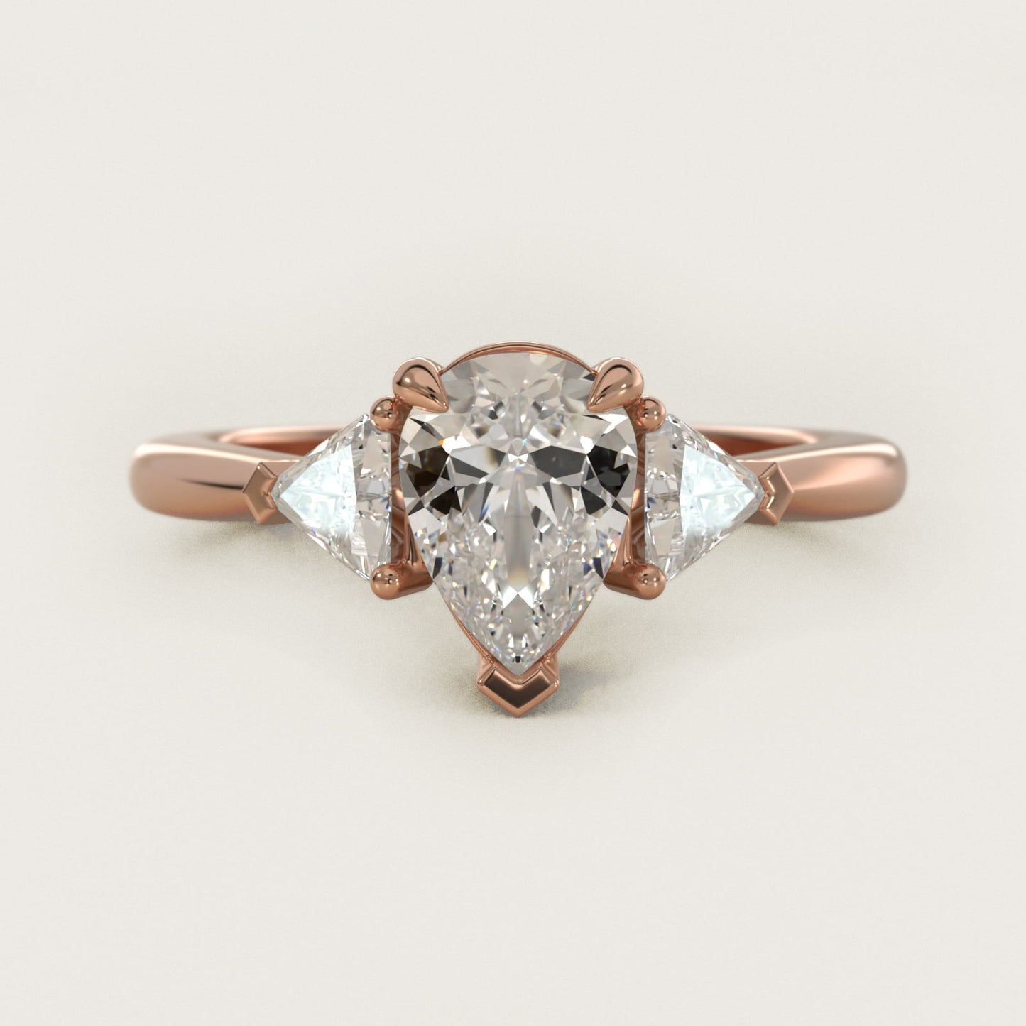 Three-Stone Trillion Diamond Engagement Ring in 14k Rose Gold (1/3 ct. tw.) - Pear Center