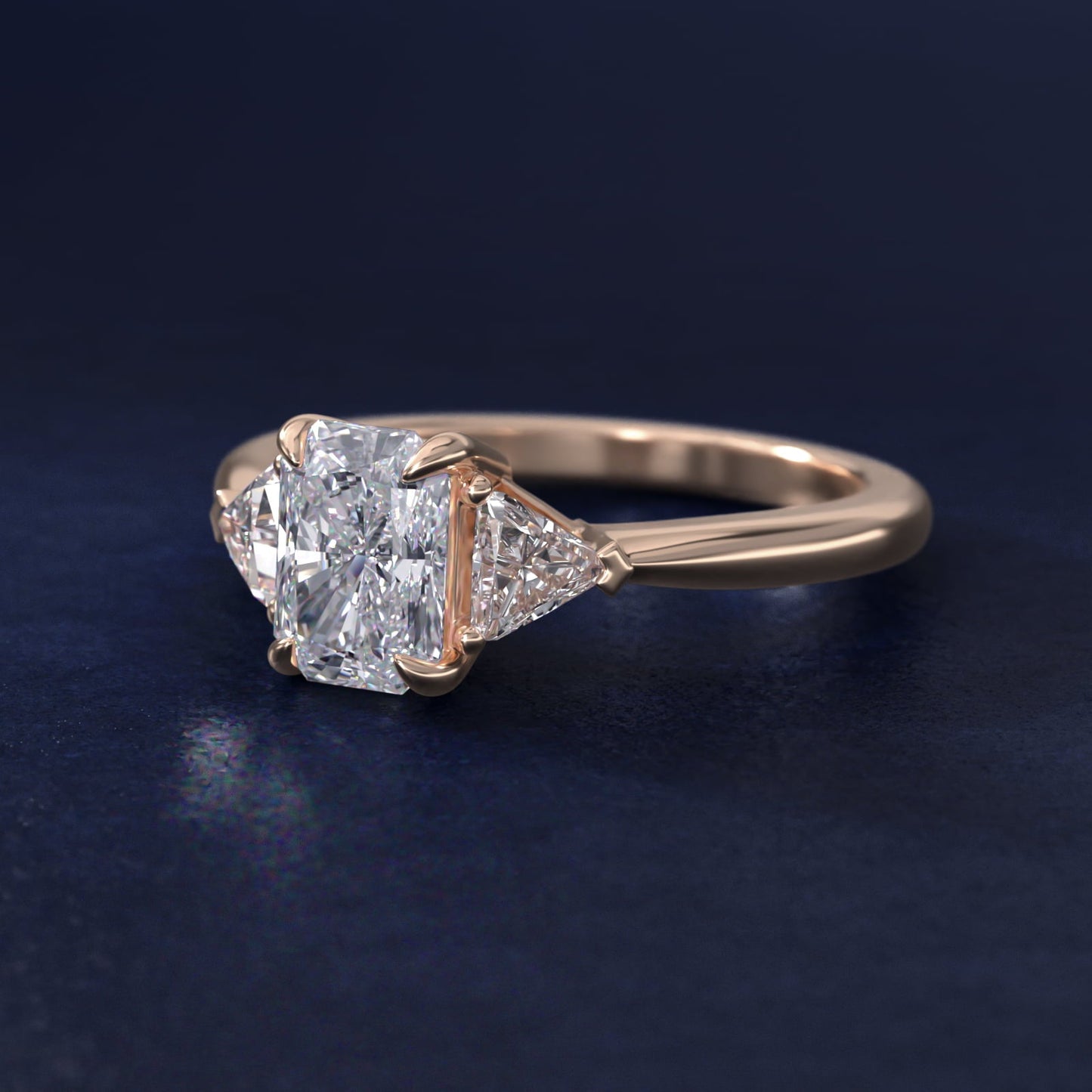 Three-Stone Trillion Diamond Engagement Ring in 18k Rose Gold (1/3 ct. tw.) - Radiant Center