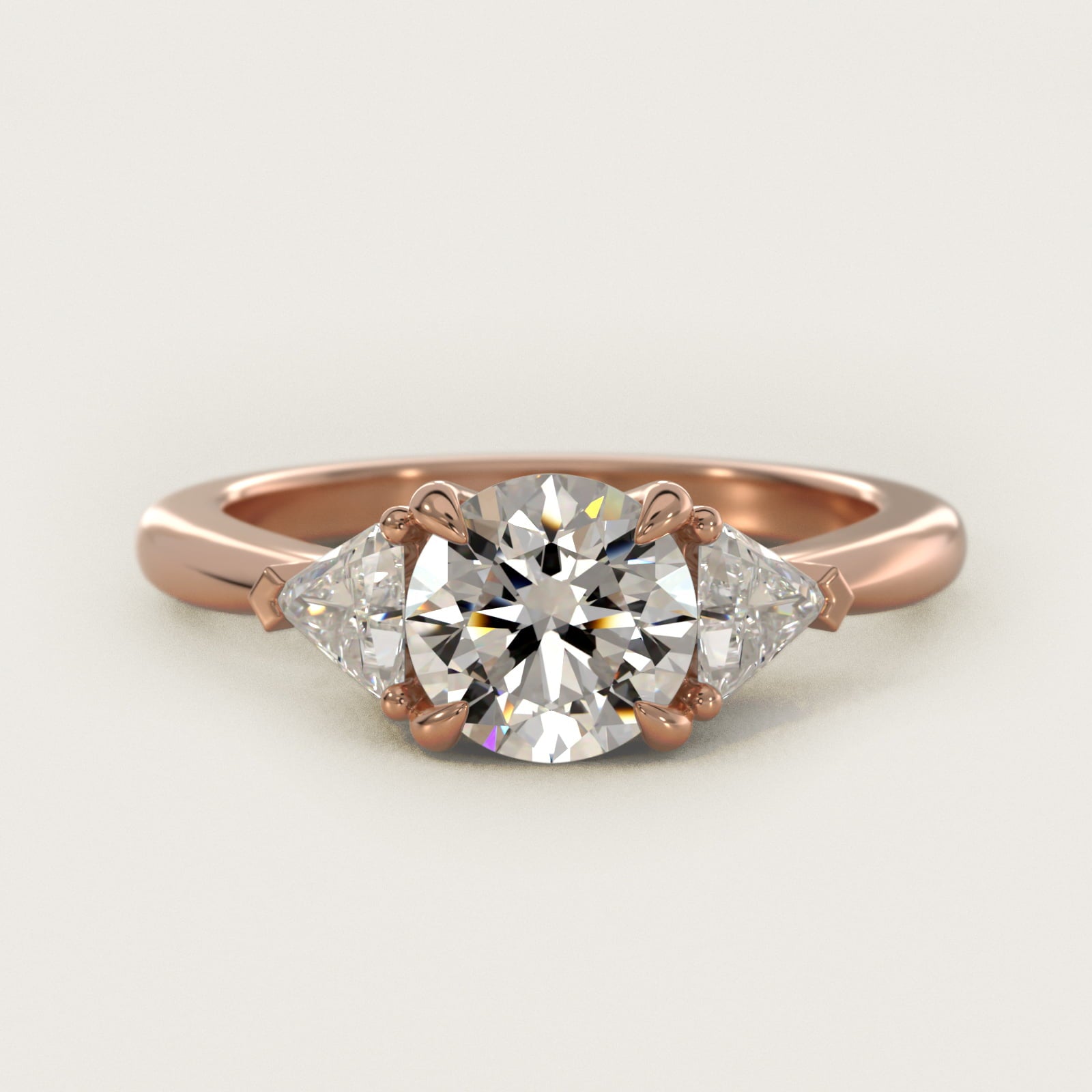 Three-Stone Trillion Diamond Engagement Ring in 14k Rose Gold (1/3 ct. tw.) - Round Center