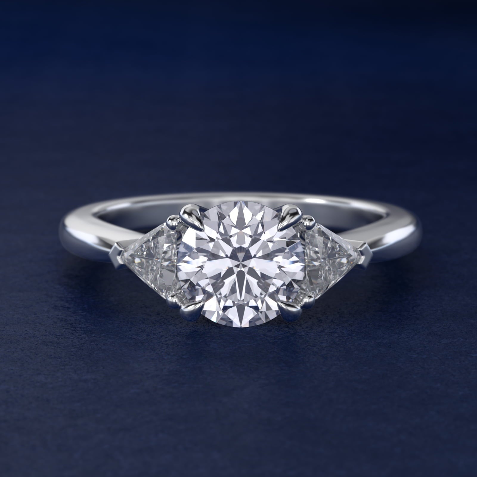 Three-Stone Trillion Diamond Engagement Ring in Platinum (1/3 ct. tw.) - Round Center
