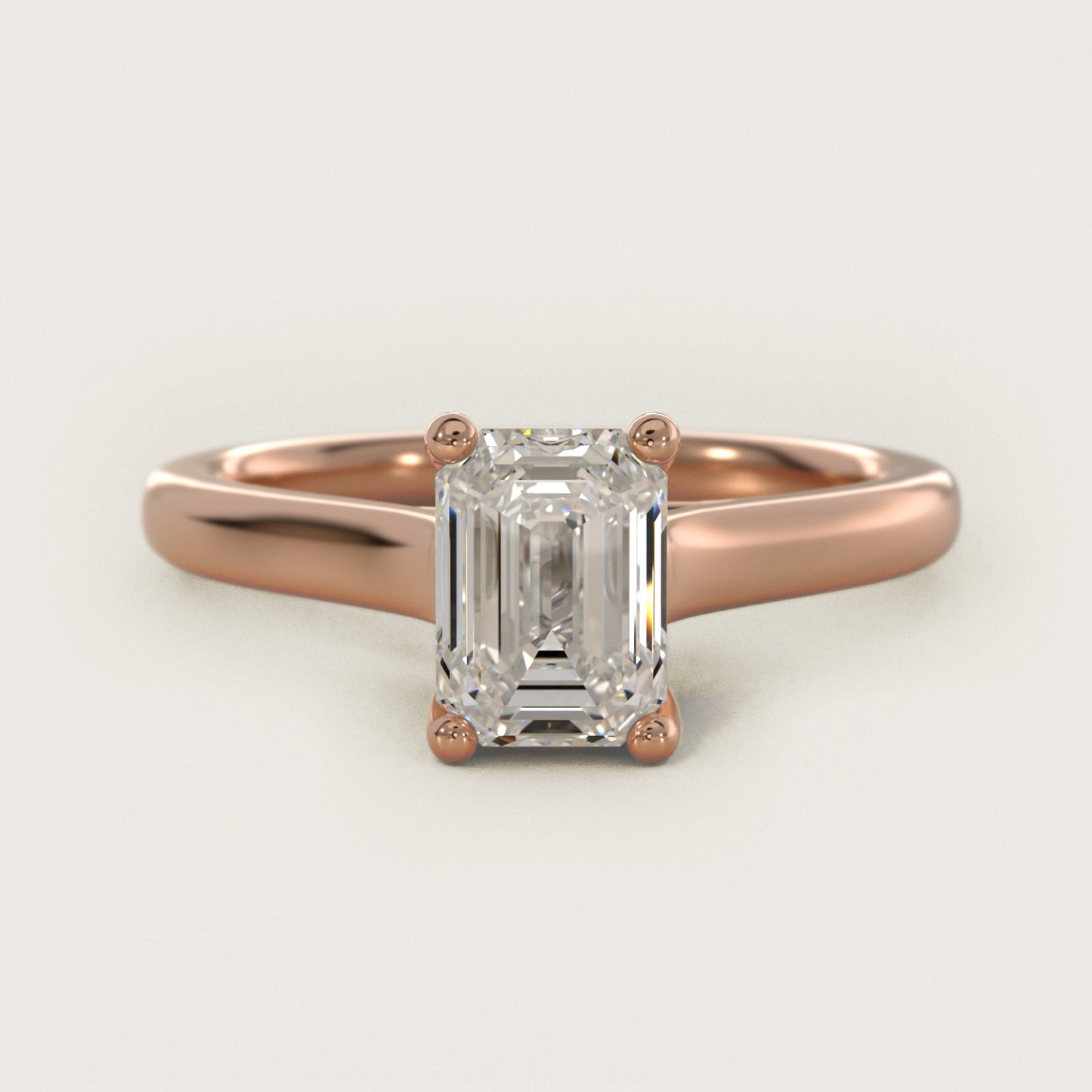 Twist Bridge Solitaire Engagement Ring in 14k Rose Gold - Emerald Center