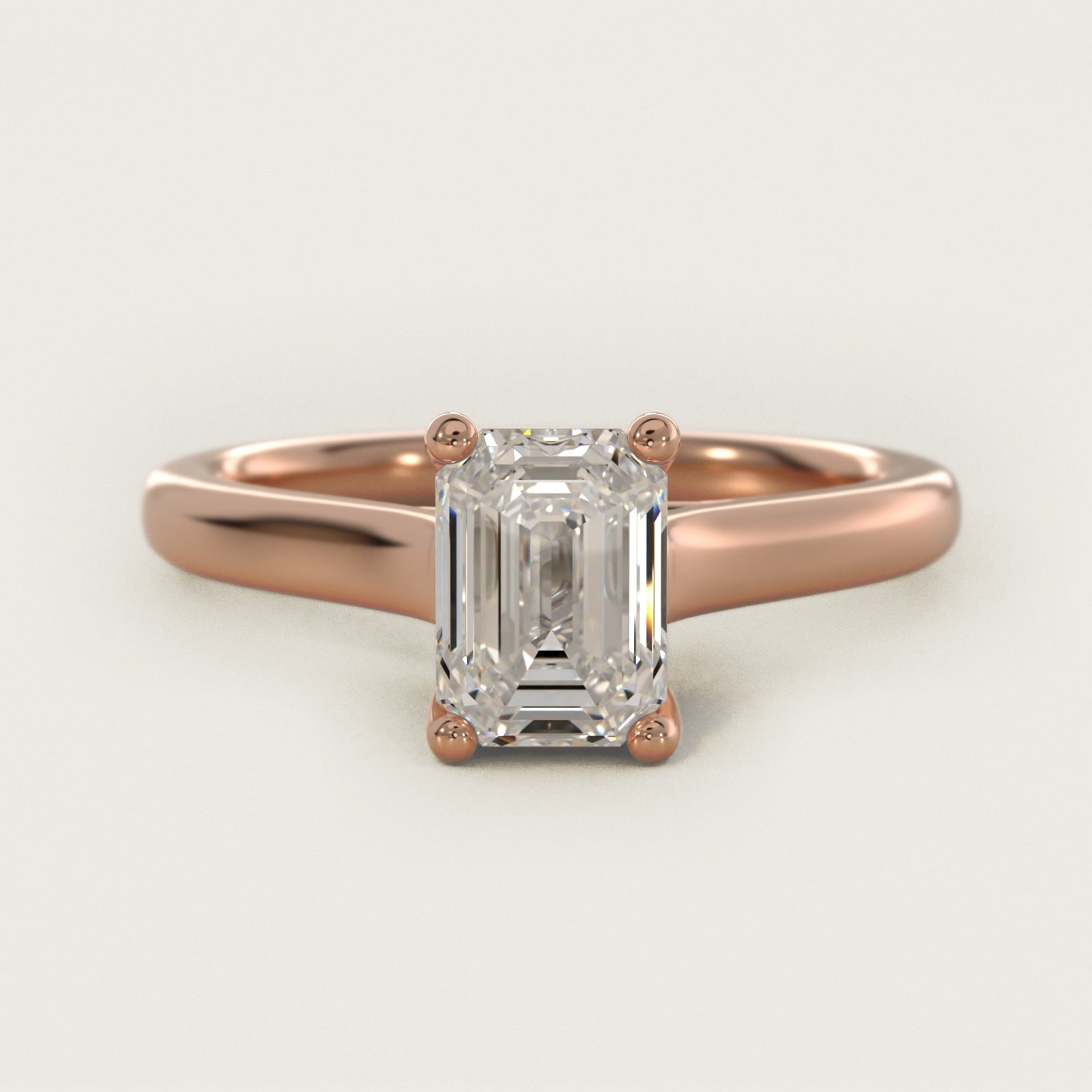 Twist Bridge Solitaire Engagement Ring in 18k Rose Gold - Emerald Center