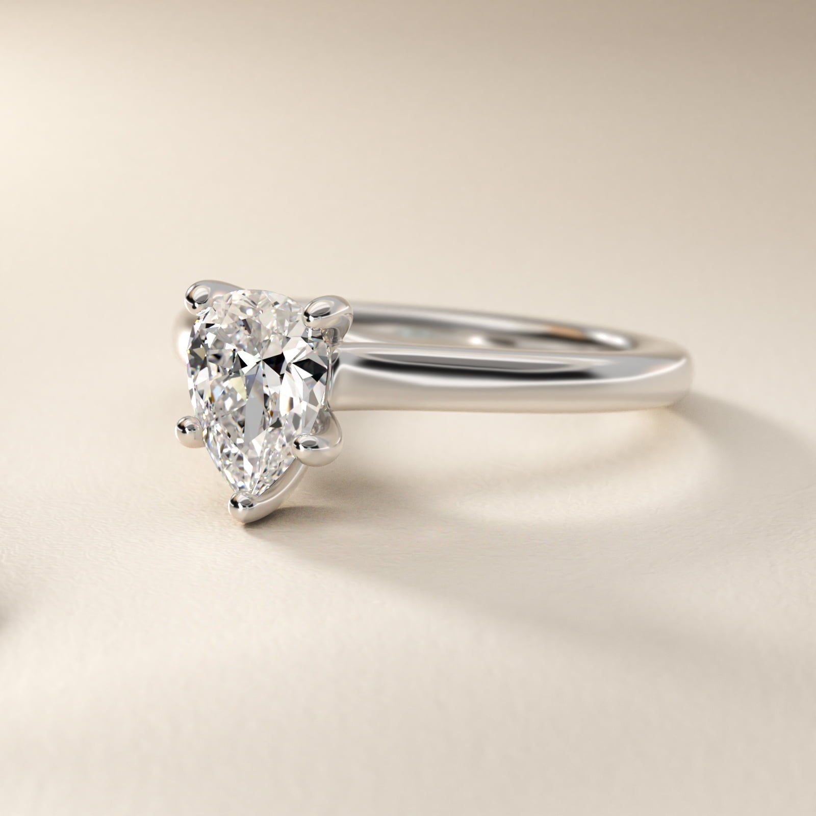 Twist Bridge Solitaire Engagement Ring in Platinum - Pear Center