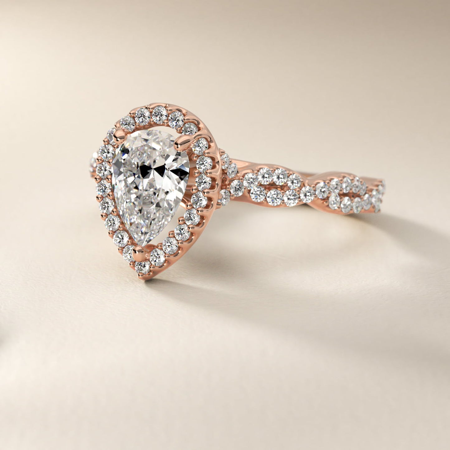 Twisted Band Halo Diamond Engagement Ring in 18k Rose Gold (1/3 ct. tw.) - Pear Center