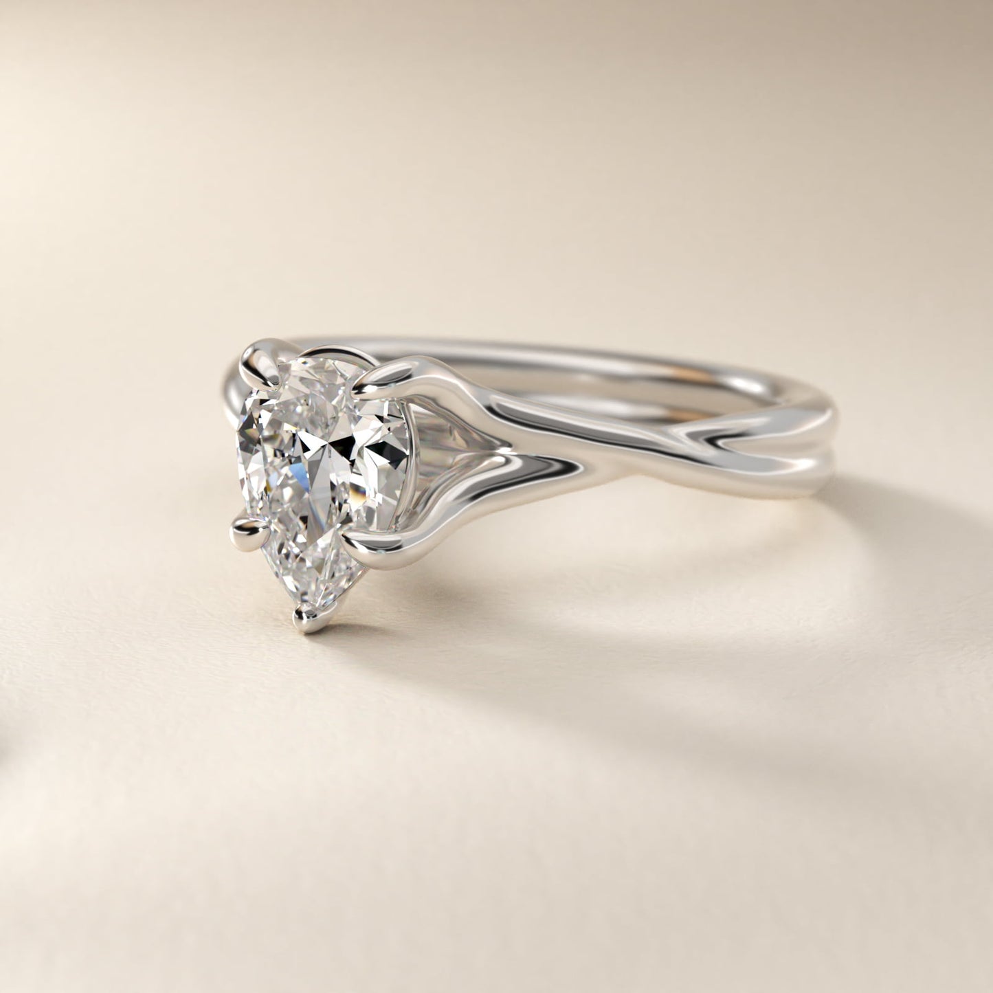 Twisted Shank Contemporary Solitaire Engagement Ring In 18k White Gold By James Allen - Pear Center