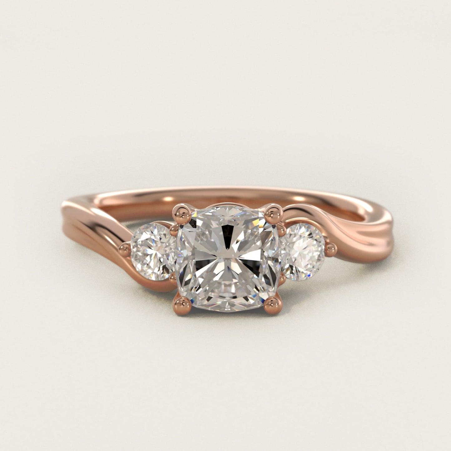 Wrapped Shank Three Stone Diamond Engagement Ring in 14k Rose Gold - Cushion Center
