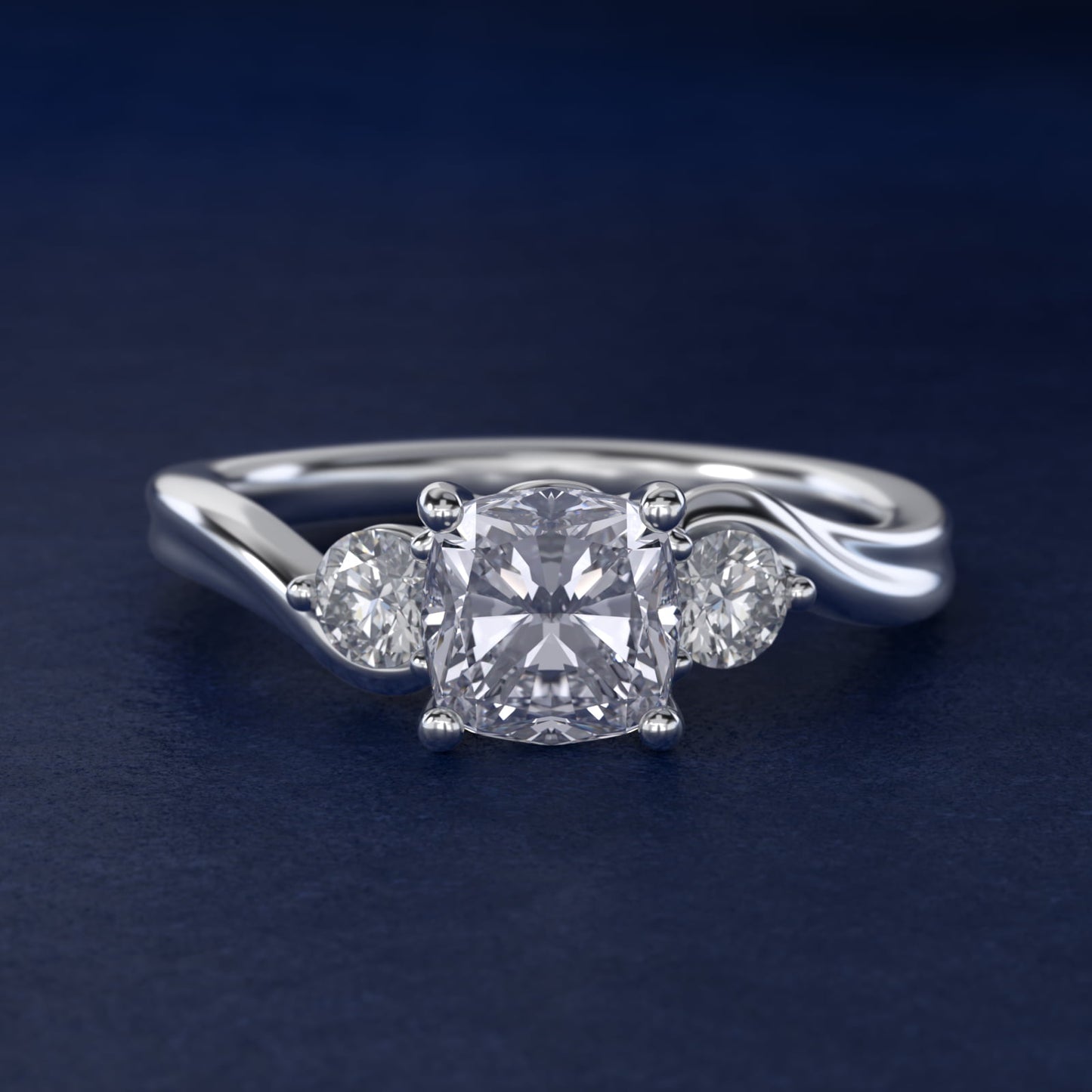 Wrapped Shank Three Stone Diamond Engagement Ring in Platinum - Cushion Center