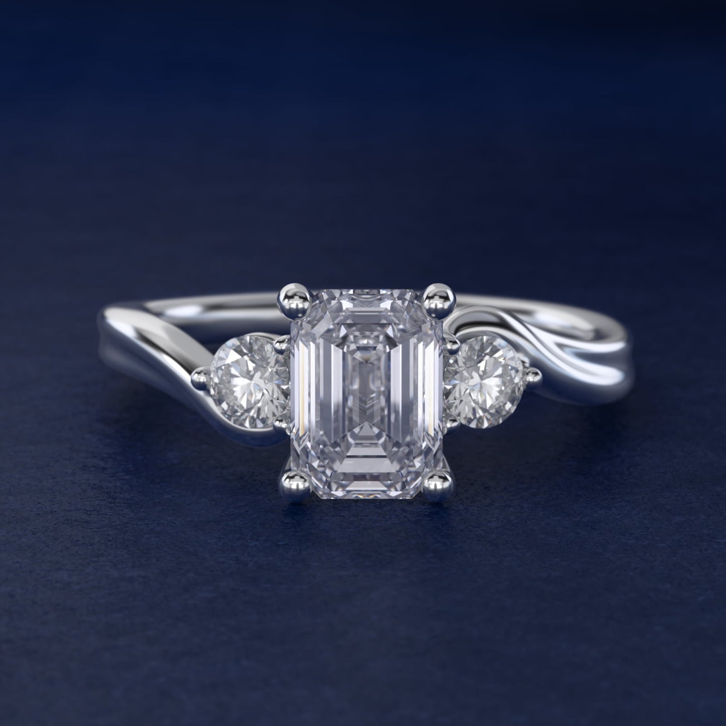 Wrapped Shank Three Stone Diamond Engagement Ring in Platinum - Emerald Center