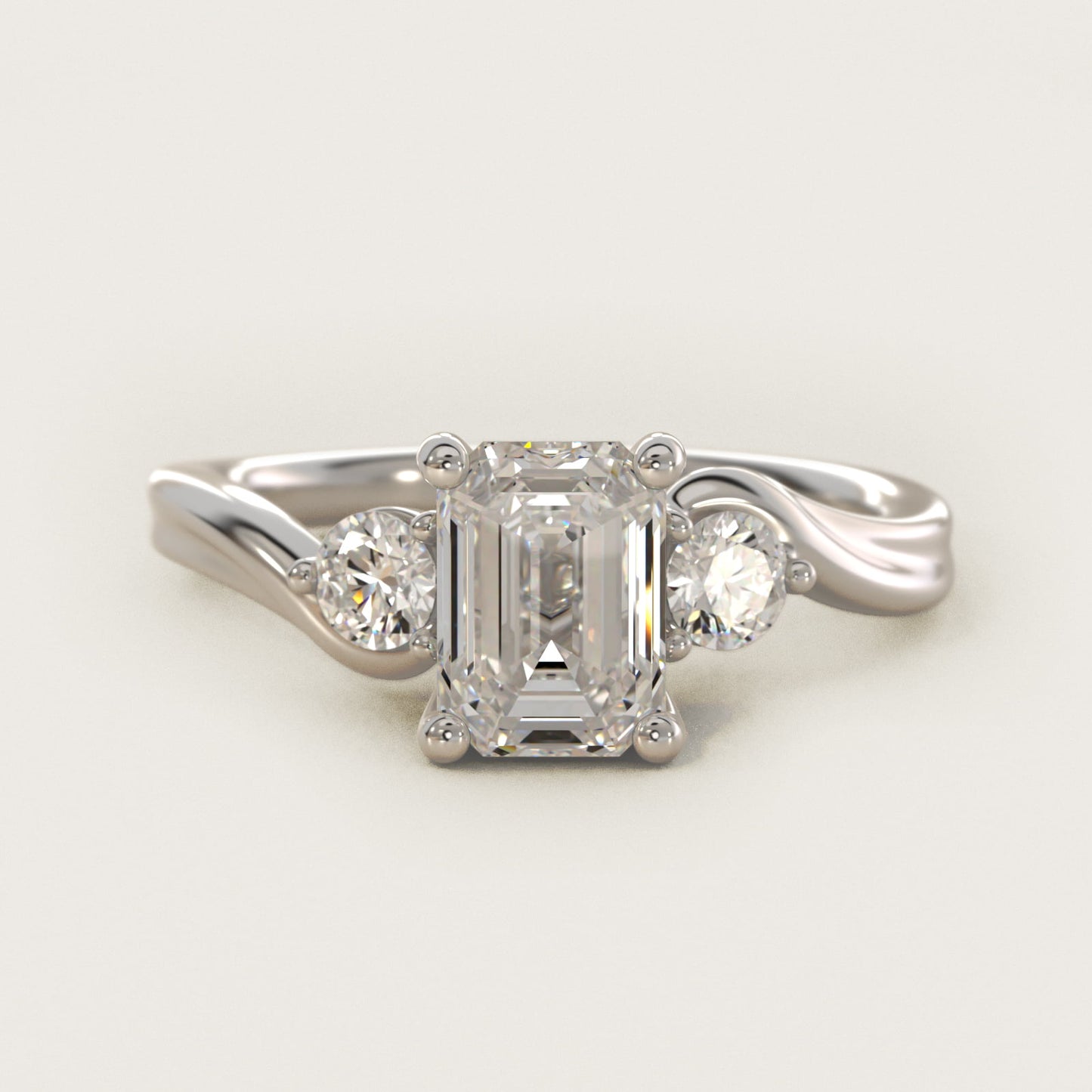 Wrapped Shank Three Stone Diamond Engagement Ring in Platinum - Emerald Center