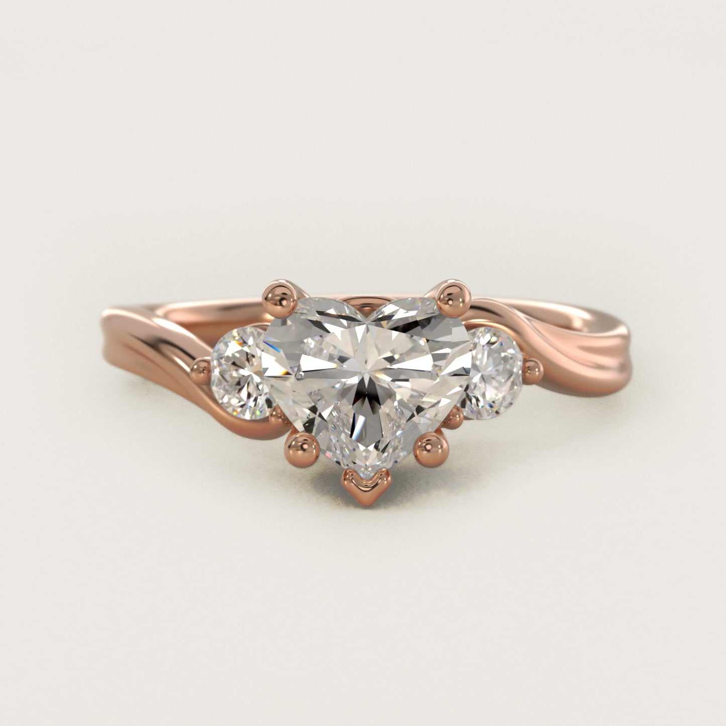 Wrapped Shank Three Stone Diamond Engagement Ring in 14k Rose Gold - Heart Center
