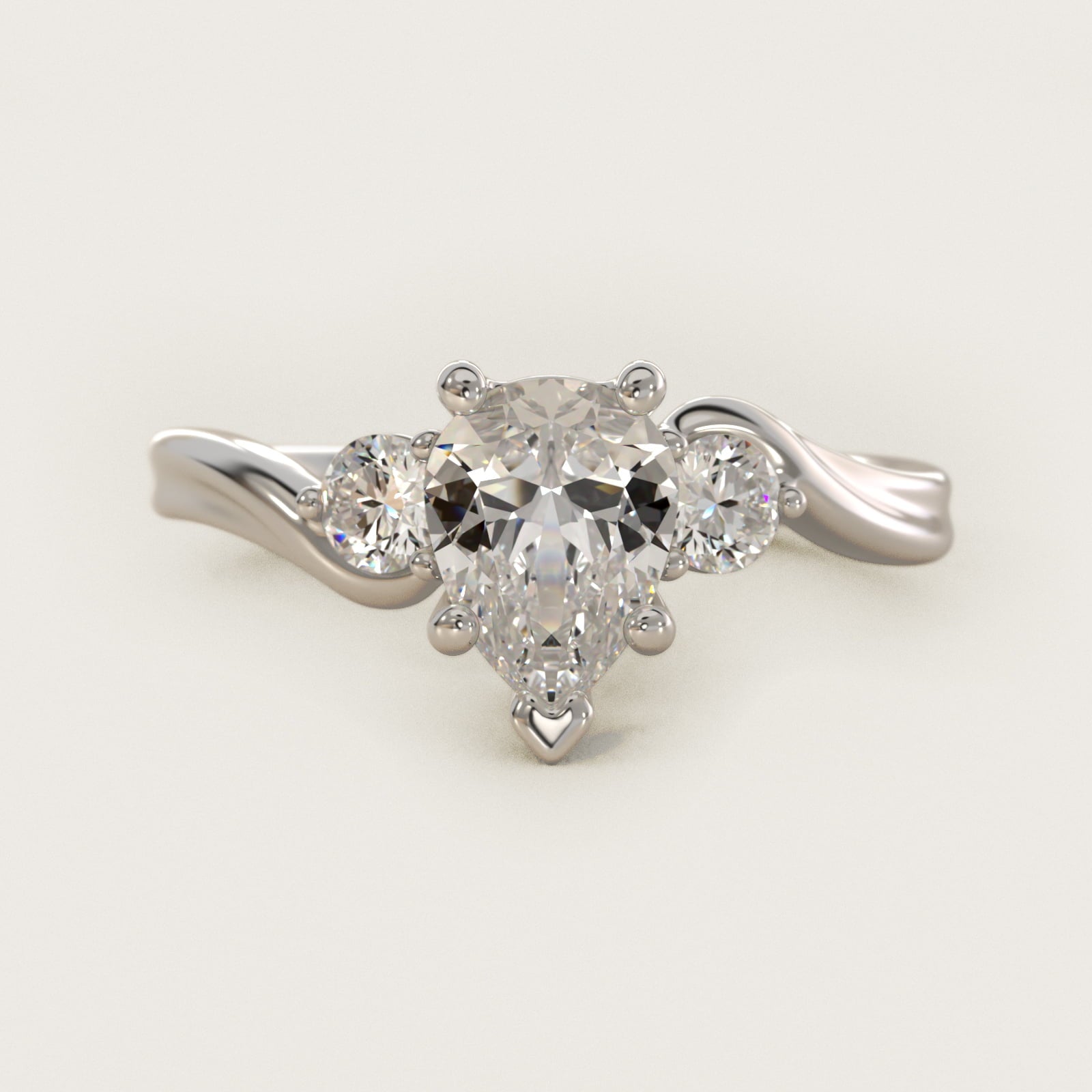 Wrapped Shank Three Stone Diamond Engagement Ring in Platinum - Pear Center
