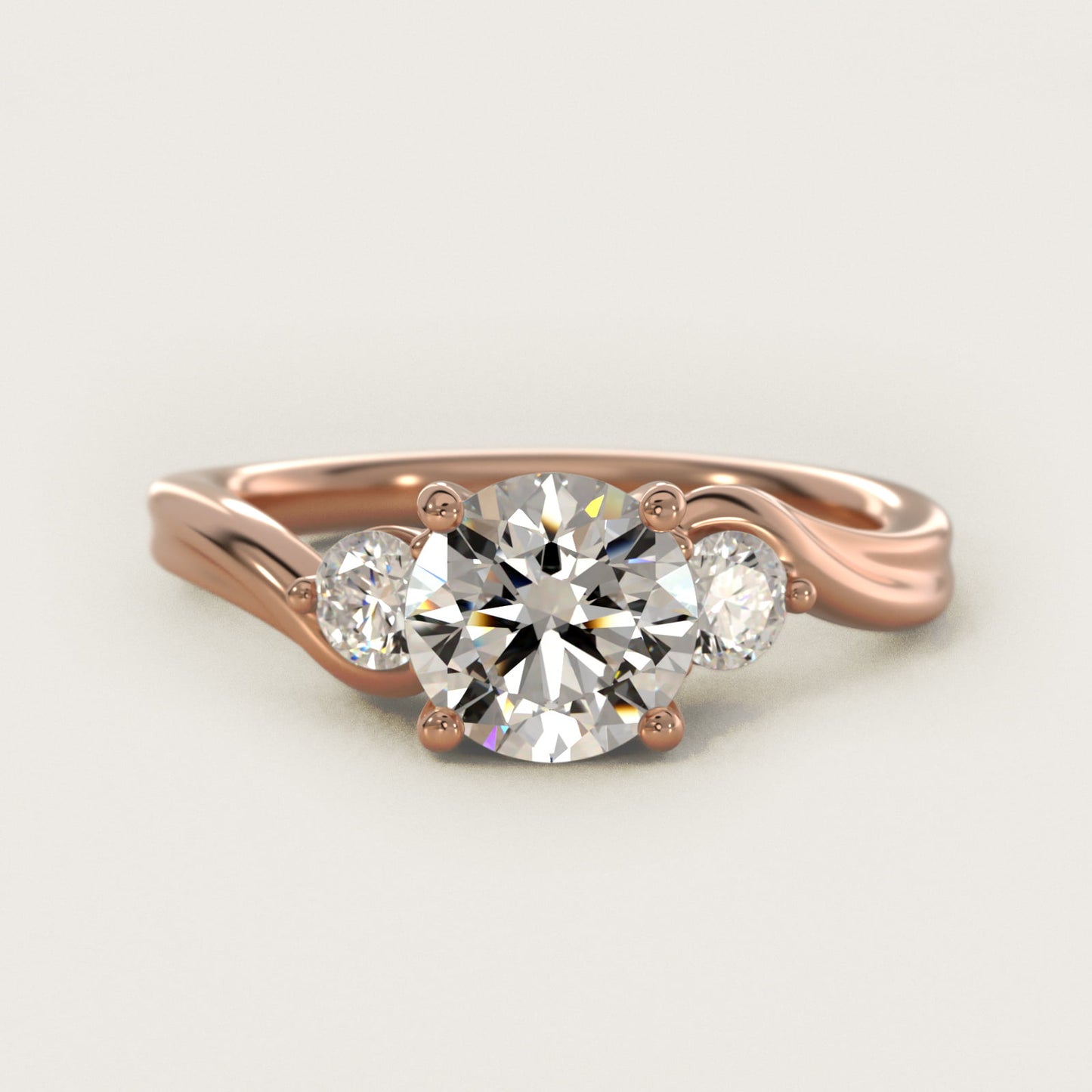 Wrapped Shank Three Stone Diamond Engagement Ring in 18k Rose Gold - Round Center